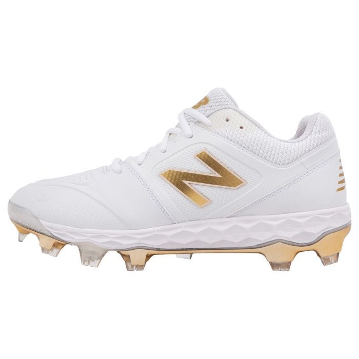 white and gold new balance baseball cleats