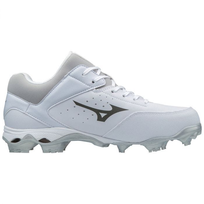 white molded softball cleats