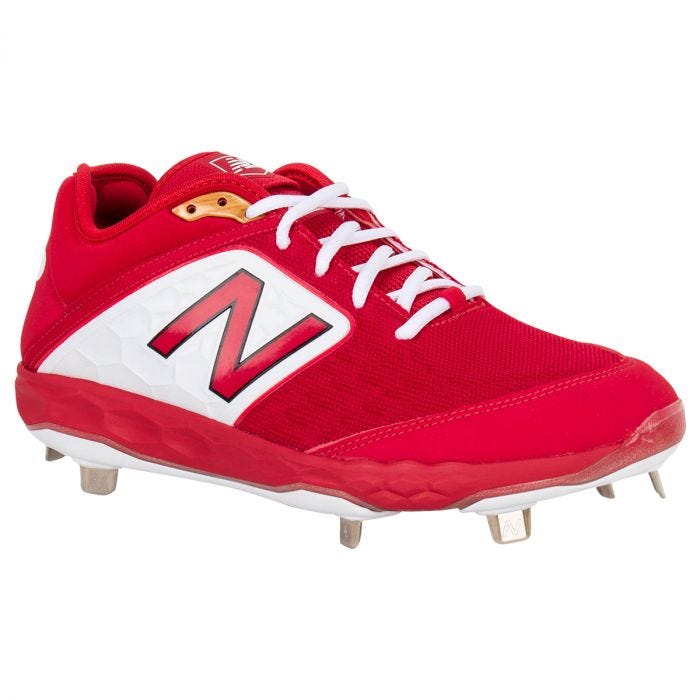 red white and blue new balance cleats