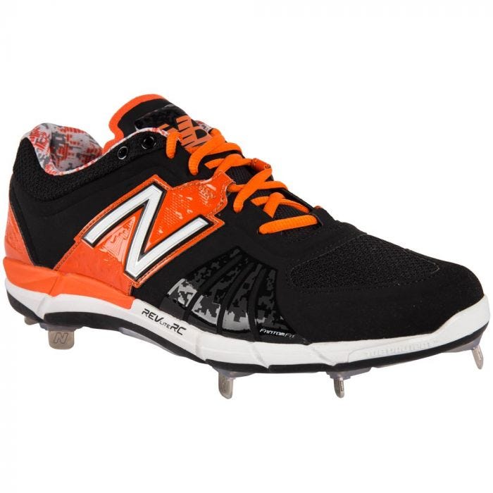 orange and black new balance cleats